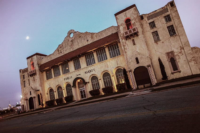 The OKC Farmers Public Market at night, seen from street level
